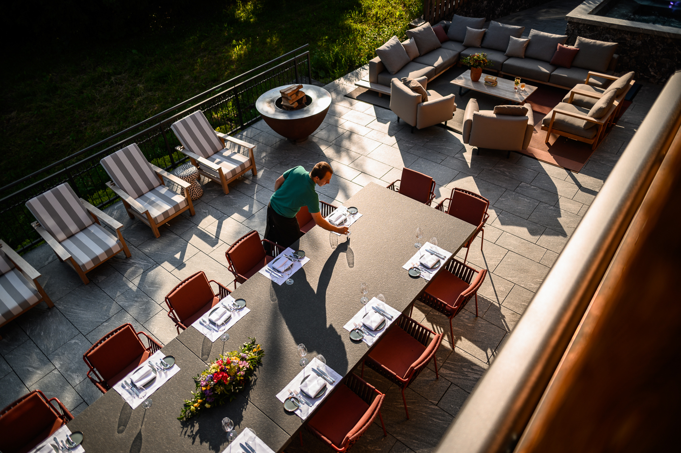 Guests seated on a hospitality terrace with heated cushions